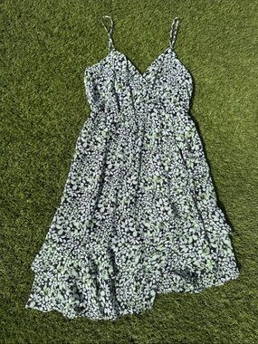 BCBGeneration Black Dress with Light Green and White Floral Print Asymmetrical